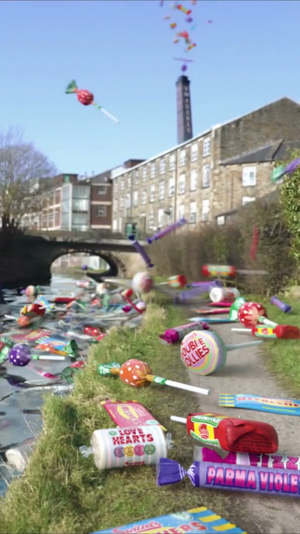 Sweets and river water interacting in the foreground.